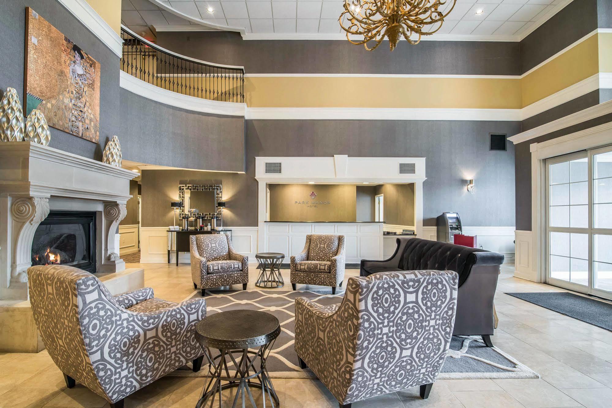 Park Manor Hotel Clifton Park Exterior foto The lobby of the Best Western Premier Executive Residency Royal Palm Beach